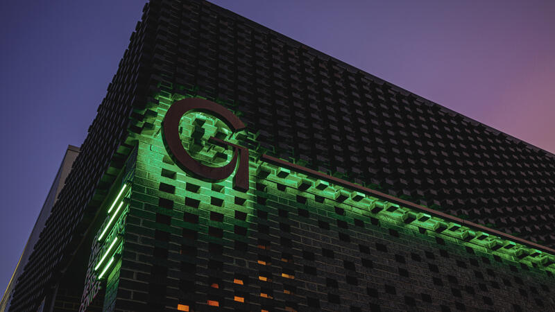 Evening view of Exterior Green Line signage